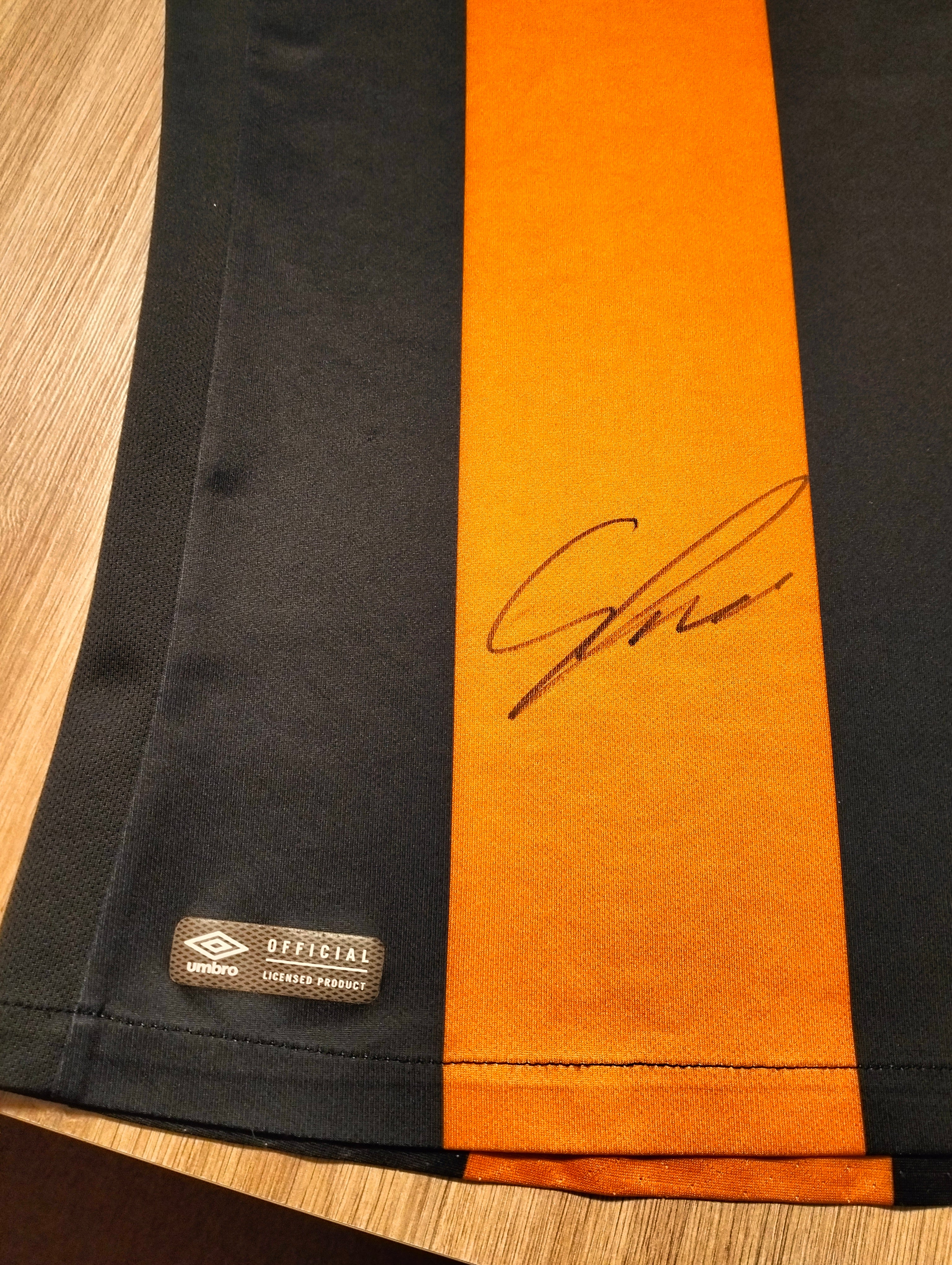 Original Umbro Hull City football shirt autographed by Kamil Grosicki